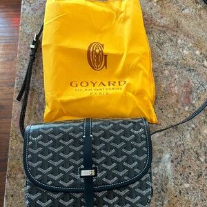 Navy blue monogram crossbody bag. NWT dust bag included. Copy. Not authentic